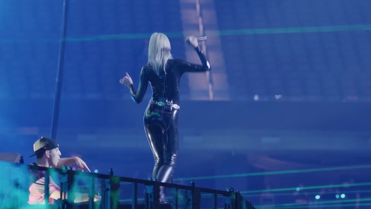 GG Magree in latex catsuit at ILLENIUM’s “Trilogy” concert